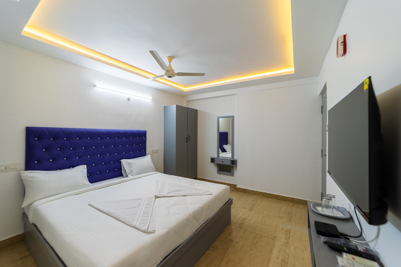 Deluxe Room with king-size bed and modern furnishings