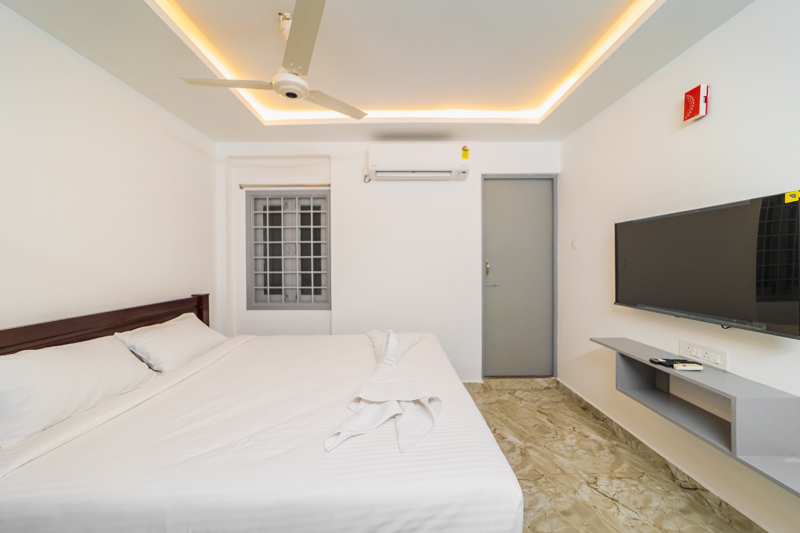 Standard Premium Room seating area with mini fridge