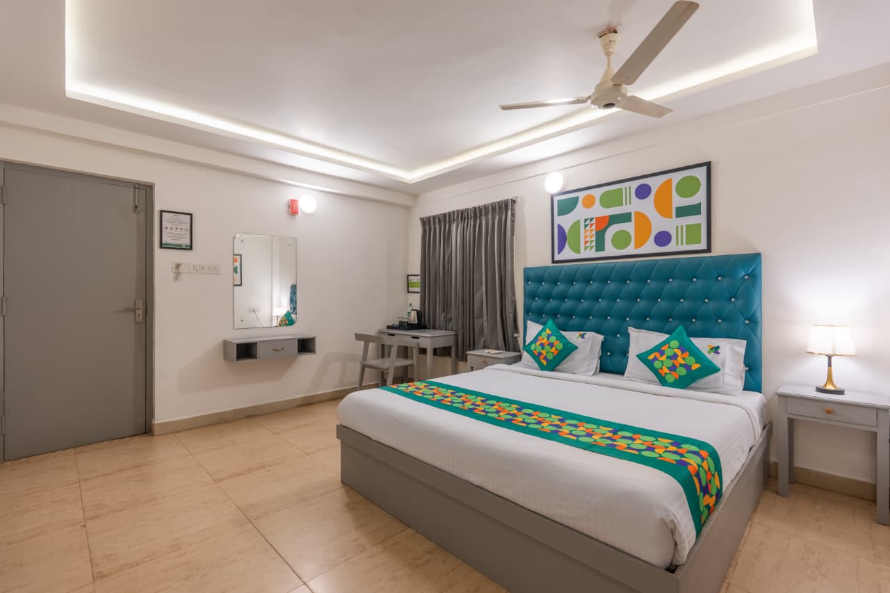 Deluxe Maple Room – King Bed with Teal Tufted Headboard | Bonne Chance Heritage Residence, Puducherry