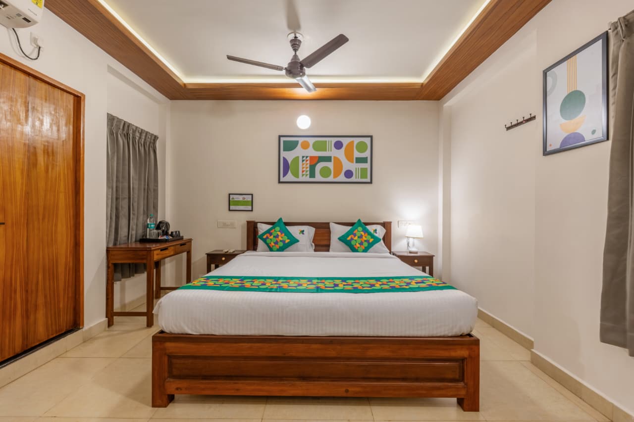 Deluxe Maple Room – Wooden King Bed – Front View | Bonne Chance Heritage Residence, Puducherry