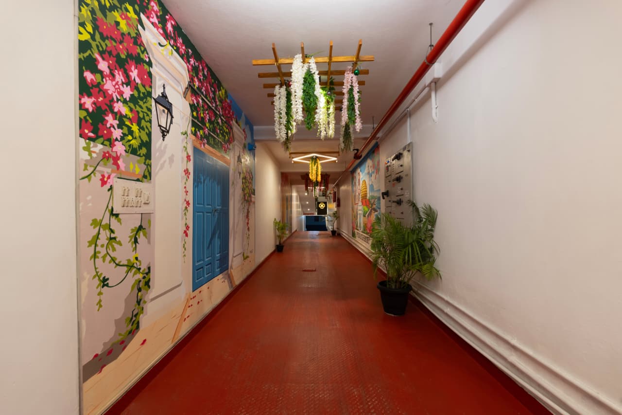 Corridor with Hand-Painted Heritage Mural | Bonne Chance Heritage Residence, Puducherry